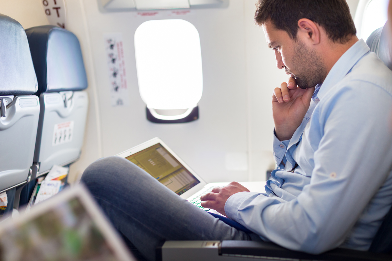 Tips for Long Flights: How to Pass the Time - Check Your Email with IFE | AdonisOne