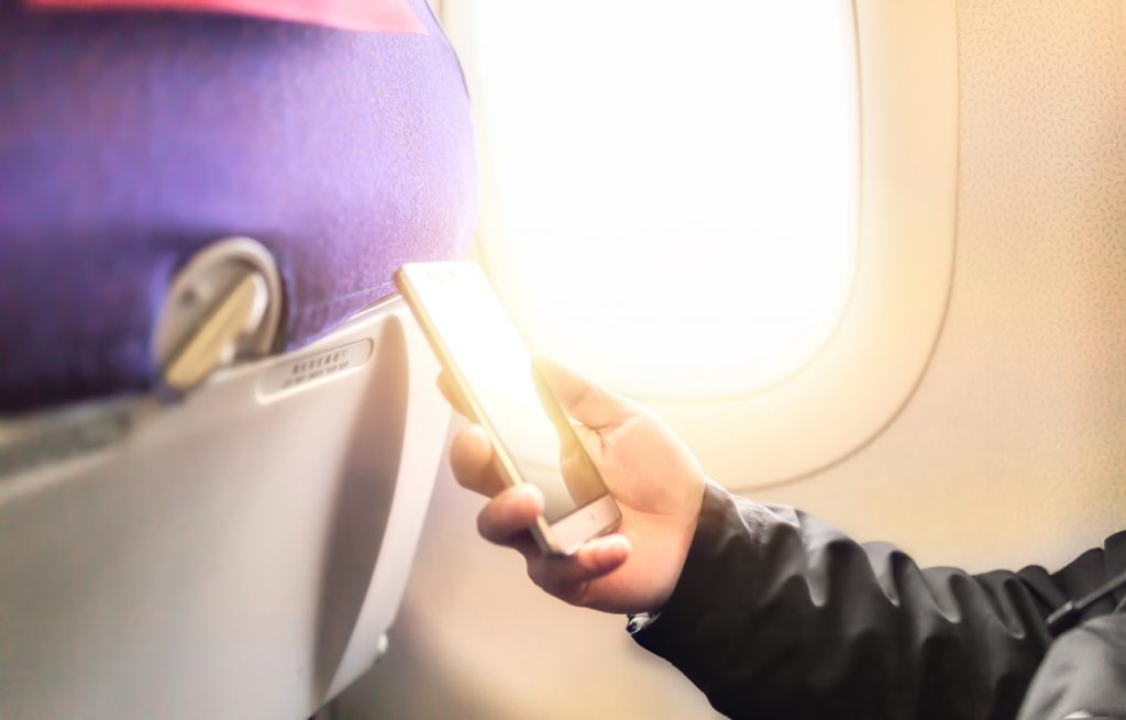 Using Phone On Airplane - BYOD - Bring Your Own Device Entertainment | AdonisOne