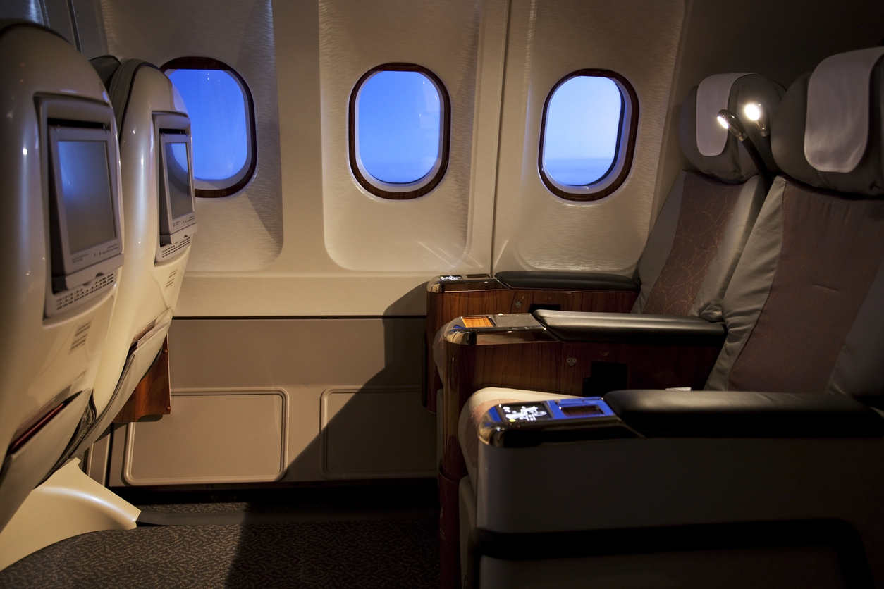Benefits of Flying First Class with in-flight Entertainment Systems | AdonisOne